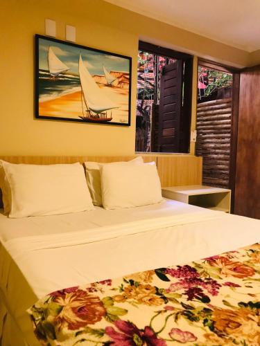 https://www.booking.com/hotel/br/pousada-latitude.en.html