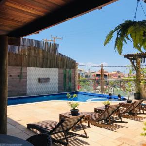 https://www.booking.com/hotel/br/pousada-latitude.en.html